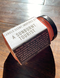 A Sunburnt Tourist Candle